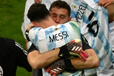 Lionel Messi celebrates with goalkeeeper Emiliano Martinez whose three penalty shoot-out saves sent Argentina into the Copa America final
