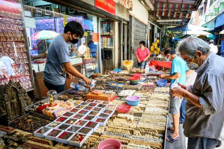The value of Buddhist amulets and other religious trinkets can rise thousands of dollars if blessed by a well-respected monk