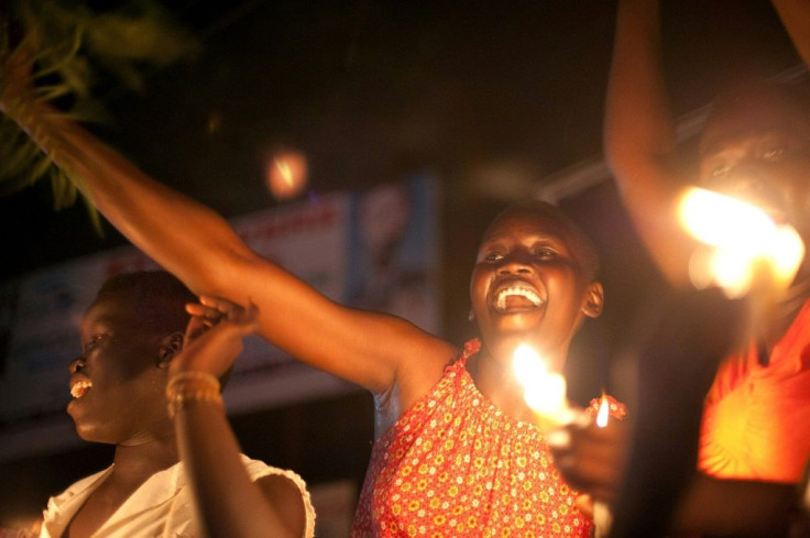 South Sudanese celebrate as the clock ticks over to midnight on July 9, 2011, the day South Sudan officially declared independence