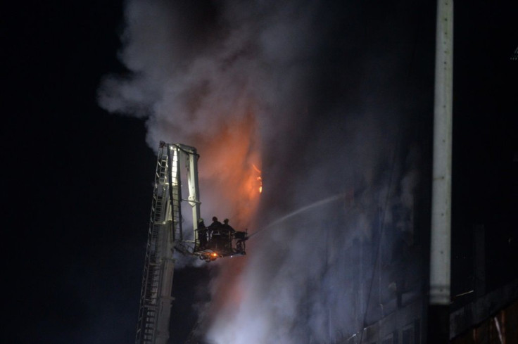 Some factory workers jumped out of the building to escape the blaze