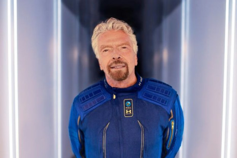 Richard Branson, founder of Virgin Galactic, wearing his company's astronaut space suit