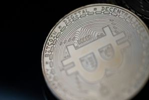 This file photo shows a physical imitation of the bitcoin cryptocurrency