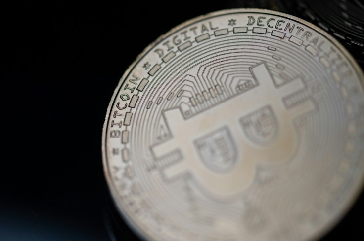 This file photo shows a physical imitation of the bitcoin cryptocurrency