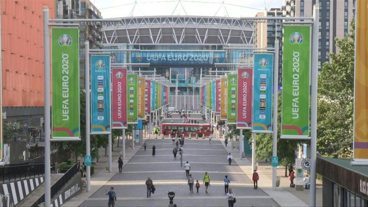 IMAGES  Some 65,000 football fans are set to descend on Wembley Stadium for the final of the virus-delayed Euro 2020 championship, the biggest crowd at a British football stadium since the start of the pandemic. Home side England are ready to make history