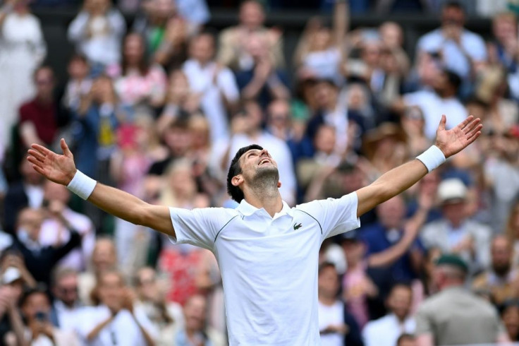 King of Centre Court: Novak Djokovic celebrates winning against Italy's Matteo Berrettini