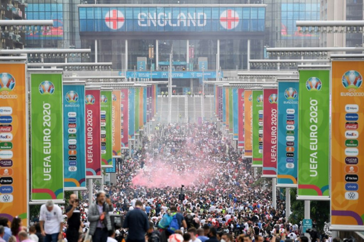 Supporters filling Wembley Way as they arrive at Wembley Stadium