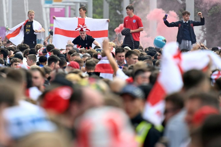 Supporters fill Olympic Way as they arrive at Wembley Stadium ahead of the Euro 2020 final between England and Italy