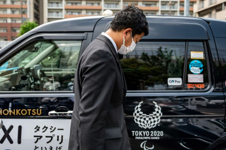 Many taxis in Tokyo carry the logo of the Olympic and Paralympic Games