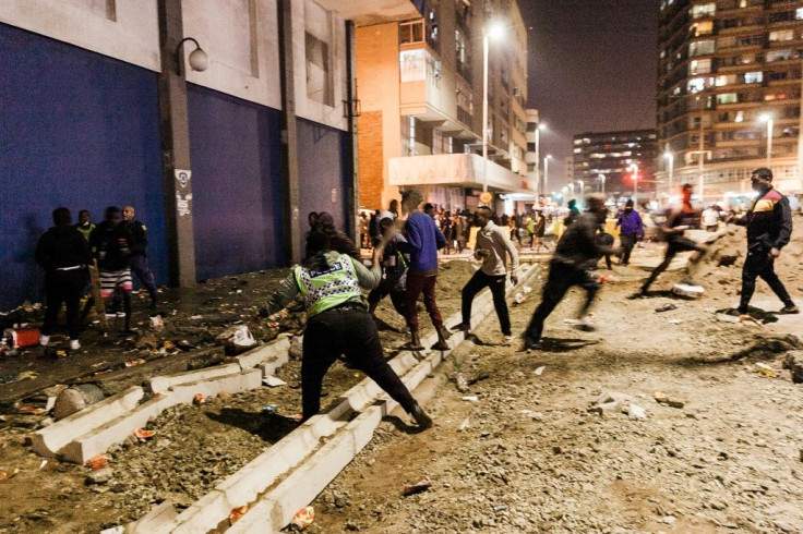 Police clashed with crowds of looters in Durban overnight