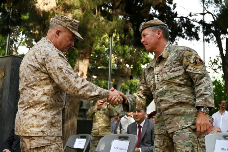 General Austin "Scott" Miller (R) -- the highest-ranked officer on the ground in Afghanistan -- handed command to General Kenneth McKenzie (L)
