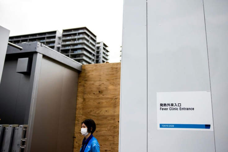 The fever clinic is a small prefab building in the centre of the village