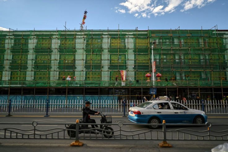 China's government says development is the antidote to discontent in Tibet, where many people still revere the Dalai Lama -- the region's spiritual leader -- and resent an influx of Chinese tourists and settlers