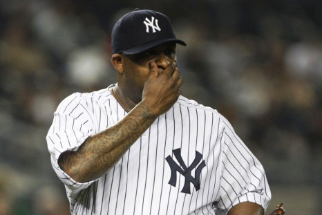 CC Sabathia, who had until midnight to opt out of his existing four-year, $92 million deal, announced in a video that he and the New York Yankees agreed on a contract extension that will keep him from testing free agency and have him stay until at 