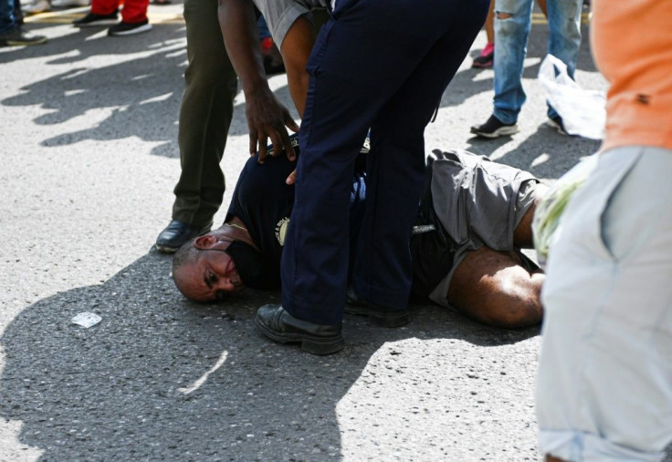 Droves of demonstrators chanted "Down with the dictatorship" in protests dispersed by police in the Cuban capital Havana