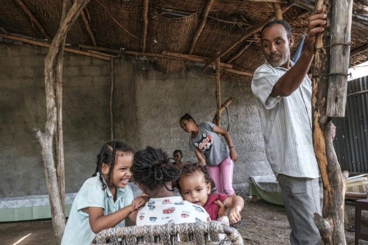 Asfaw Abera and his family are among the first wave of 15,000 Amhara families local authorities plan to eventually bring over from Sudan