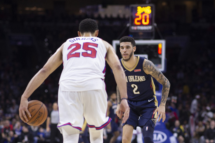 Ben Simmons #25 of the Philadelphia 76ers dribbles the ball against Lonzo Ball #2 of the New Orleans Pelicans