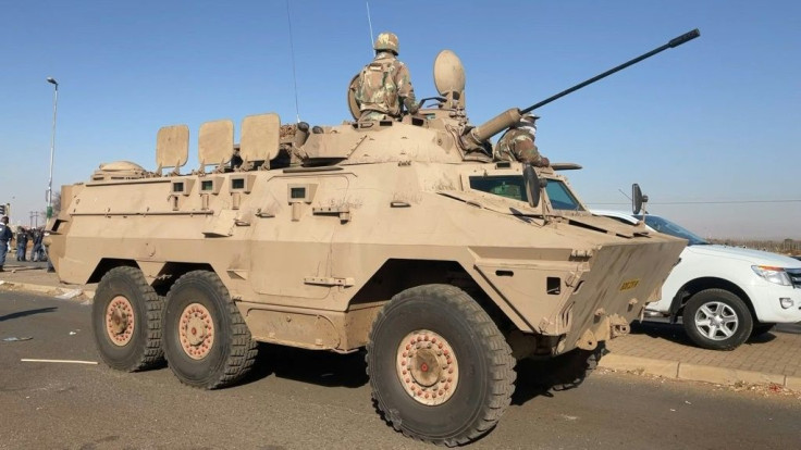 IMAGES South African military tanks are deployed on the streets near Johannesburg as unrest rages for the sixth day running. Seventy-two people have died and more than 1,200 people have been arrested, according to official figures, since former president 