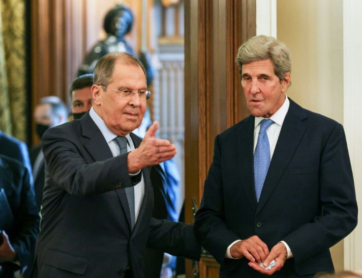 Russian Foreign Minister Sergei Lavrov welcomes US climate envoy John Kerry for a meeting in Moscow