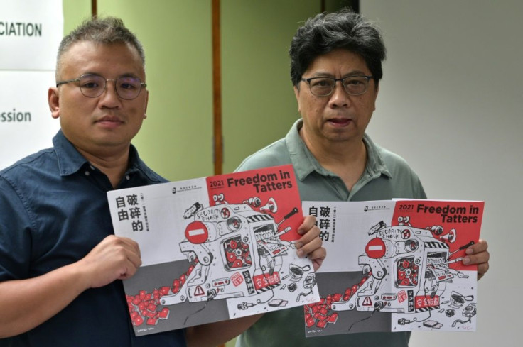 The HKJA said there were 'knives hanging over journalists' heads' in Hong Kong