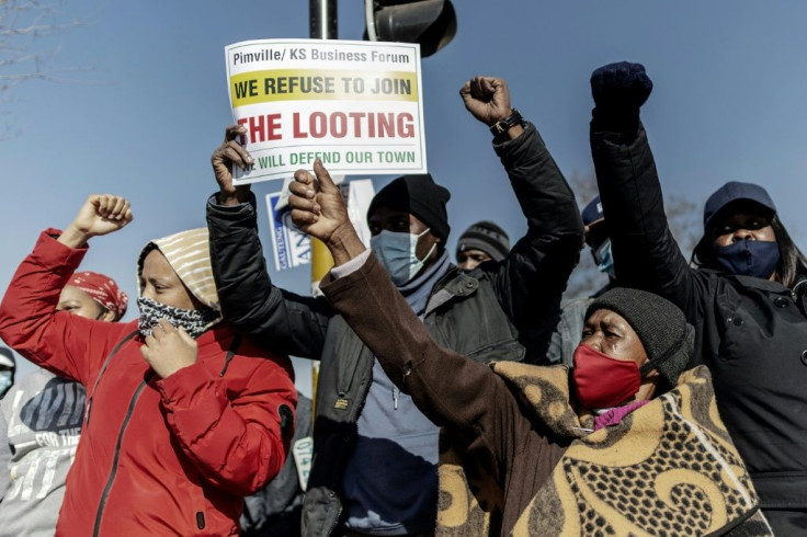 Protest: Residents of Soweto shouted their anger on Wednesday at the damage caused by the looting