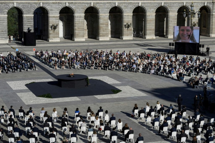 Guests attend a state ceremony in honour of Covid-19 victims outside the Royal Palace in Madrid on July 15, 2021