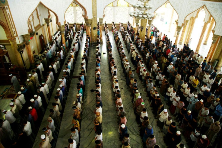 Muslims gather to pray at a mosque in Lhokseumawe, Aceh