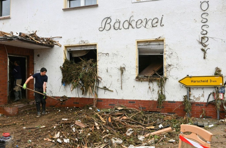 Germans were cleaning up the wreckage Friday as water ceded in some areas