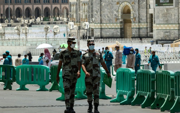 Security forces patrol in Mecca city ahead of the pilgrimage