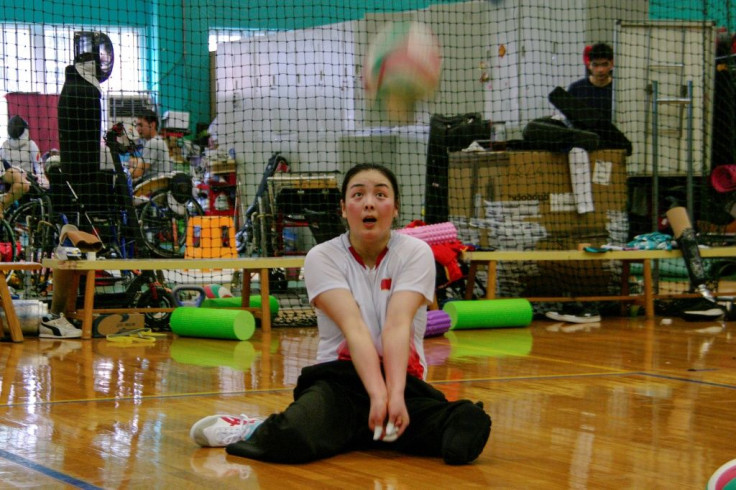 Tang Xuemei is a Paralympic gold-medallist in sitting volleyball