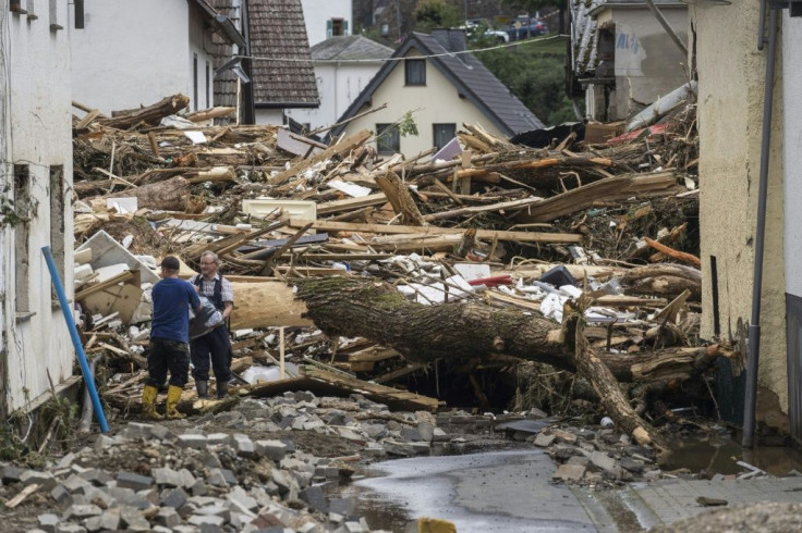 Streets in towns like Germany's Schuld are choked with debris from the sudden floods