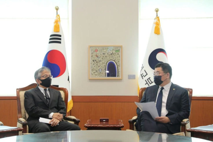 South Korea's Vice Foreign Minister Choi Jong-kun (R) summoned Japanese Ambassador Koichi Aiboshi over a diplomat's crude remarks