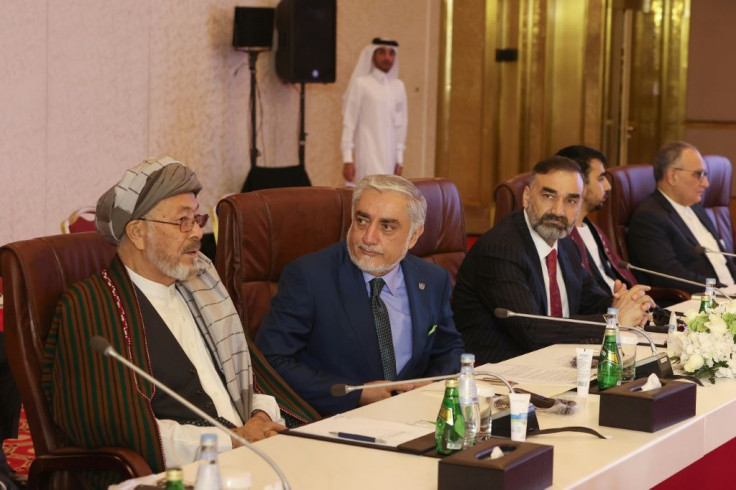 Afghanistan's former chief executive Abdullah Abdullah (2nd L) at peace talks in the Qatari capital Doha