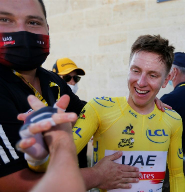 Tadej Pogacar all smiles after his eighth place on the stage effectively won the Tour