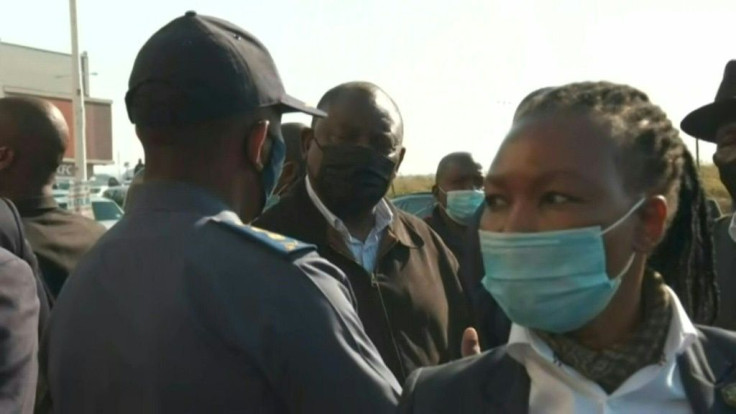 IMAGESSouth Africa's President Cyril Ramaphosa visits a site of looting in the eastern KwaZulu-Natal province following a week of deadly violence which he says had been 'planned'. Shopping malls and warehouses have been ransacked in two provinces, stoking