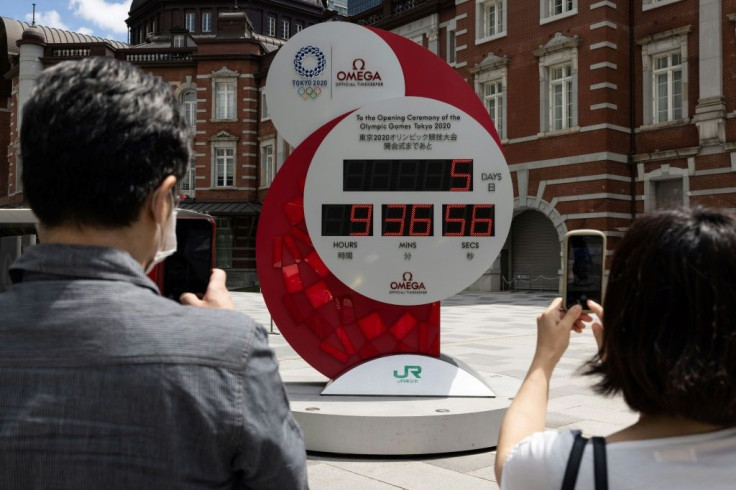 The Tokyo Olympic countdown clock shows five days to go before the opening ceremony on July 23