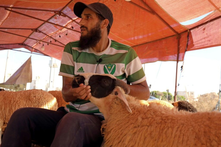 Sheep seller Osama al-Aqury blames soaring fodder prices for the rising cost of meat in Libya