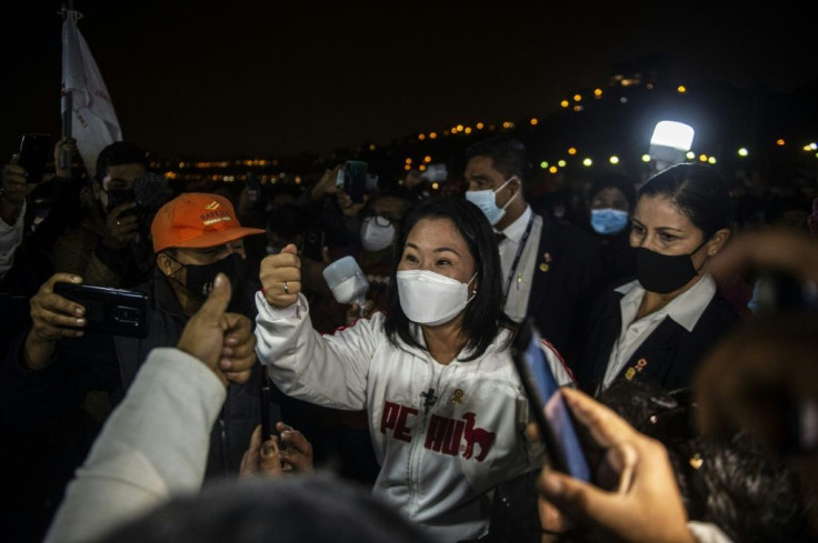 Peruvian candidate for the Fuerza Popular party, Keiko Fujimori, arrives to speak to her supporters at a beach in Lima, on July 7, 2021