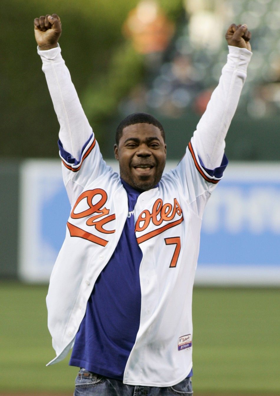 Actor and comedian Tracy Morgan, star of the NBC show quot30 Rockquot, raises his arms after throwing out the ceremonial first pitch before the MLB American League baseball game between the New York Yankees and Baltimore Orioles in Baltimore, Maryland