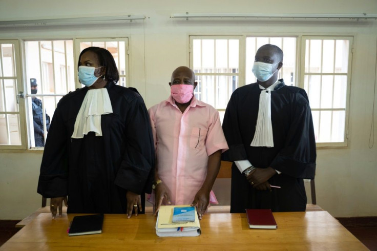 Rusesabagina, centre, seen in prison uniform at his court appearance in Kigali last October