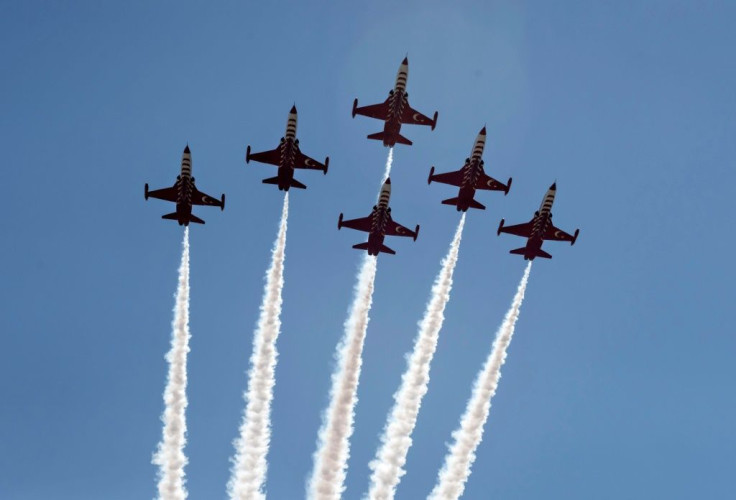 Turkish aircraft overfly a military parade in the northern part of Cyprus's divided capital Nicosia on July 20, 2021