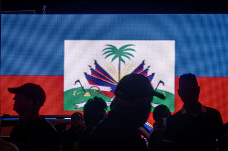 People attend a vigil in honor of Haiti's slain president Jovenel Moise, in Little Haiti neighborhood, Miami, Florida, on July 16, 2021