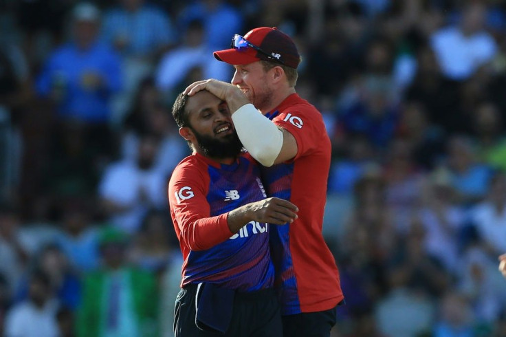 Career-best - Adil Rashid (L) celebrates dismissing Pakistan captain Babar Azam during England's three-wicket win in the 3rd T20 at Old Trafford on Tuesday