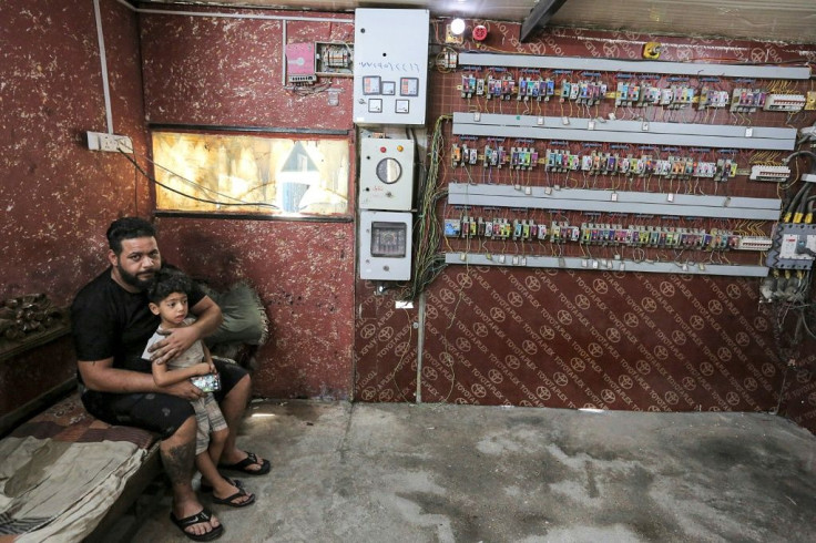 Hassan is his neighbourhood's generator handyman, installing and repairing the wires and switches to ensure the generator runs smoothly