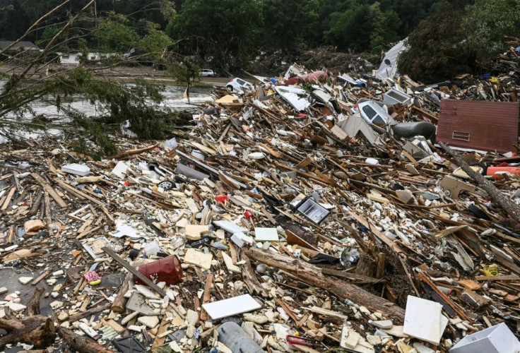 Cars are covered with wood and rubble in Altenahr in  Rhineland-Palatinate state