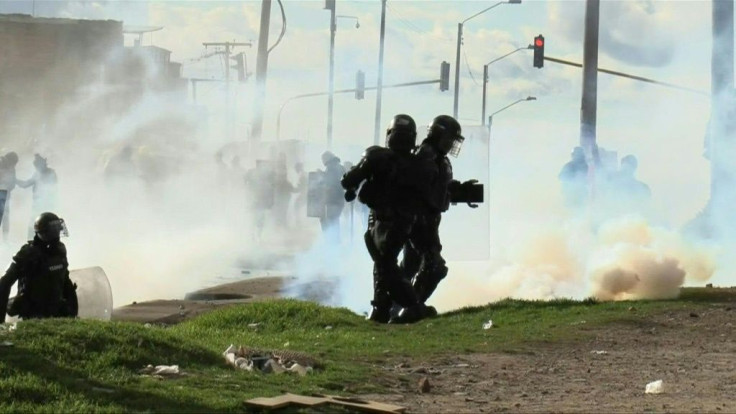 Police and protesters clash in the south of the capital Bogota as Colombians return to the streets to protest against President Ivan Duque's government, on the same day it submits a new tax reform plan to Congress.