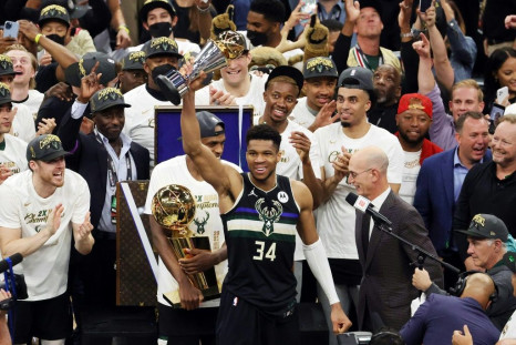 Giannis Antetokounmpo scored 50 points to power the Milwaukee Bucks over Phoenix on Tuesday to claim their first NBA title since 1971 and win NBA Finals Most Valuable Player honors