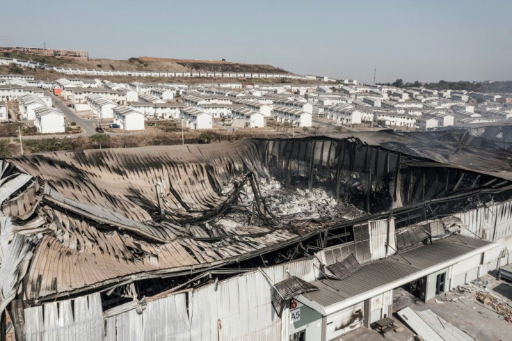 Destruction: The smouldering remains of a warehouse in Durban's Ushukela Industrial Park