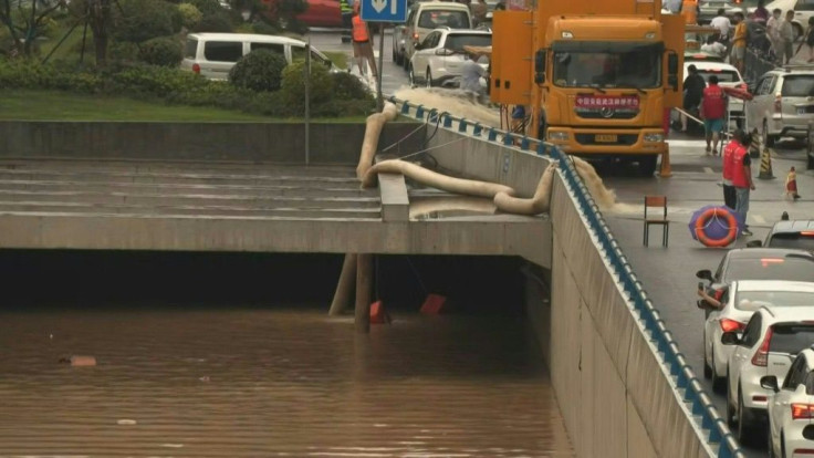 Water is being pumped out of a flooded tunnel in the central Chinese city of Zhengzhou after record rainfall caused deadly floods.