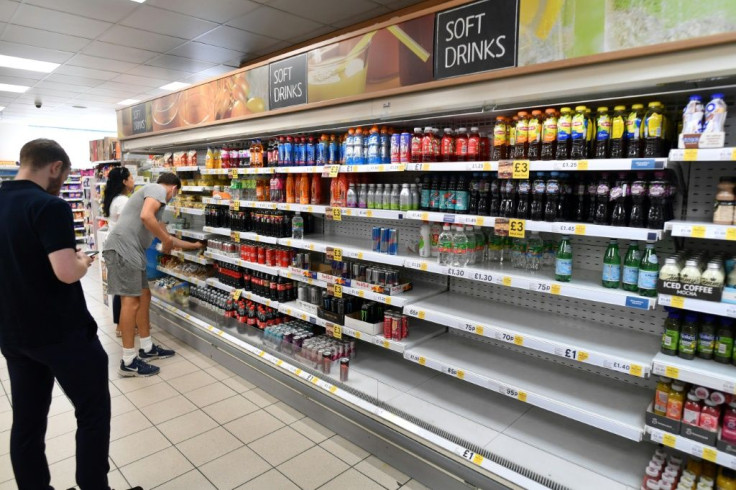 Newspapers ran photos of empty supermarket shelves as missing staff at stores as well as in supply chains hit retailer's operations