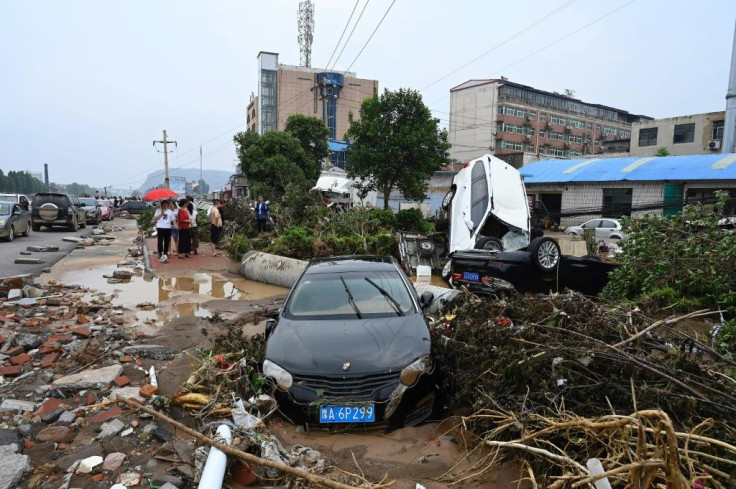 Devastated locals surveyed the damage as the rains finally subsided